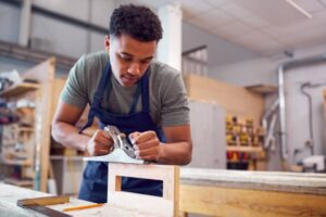 African American Carpenter Working at His Trade